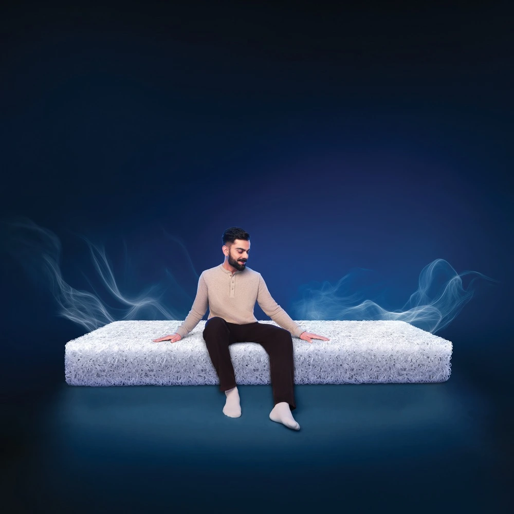 Close-up of a premium Duroflex orthopedic mattress designed with advanced spinal support layers to prevent morning backaches and body stiffness.